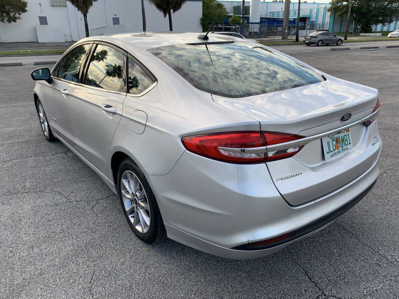 Ford Fusion Hybrid for hire